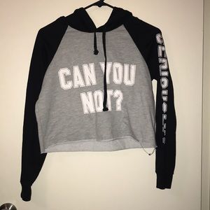 A long sleeve, crop top, hoodie